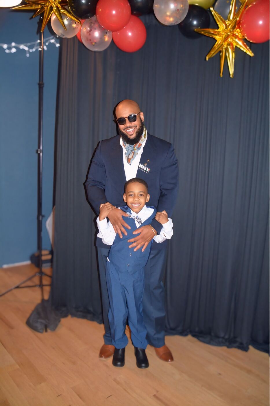 Black men gathered for community brotherhood and support.